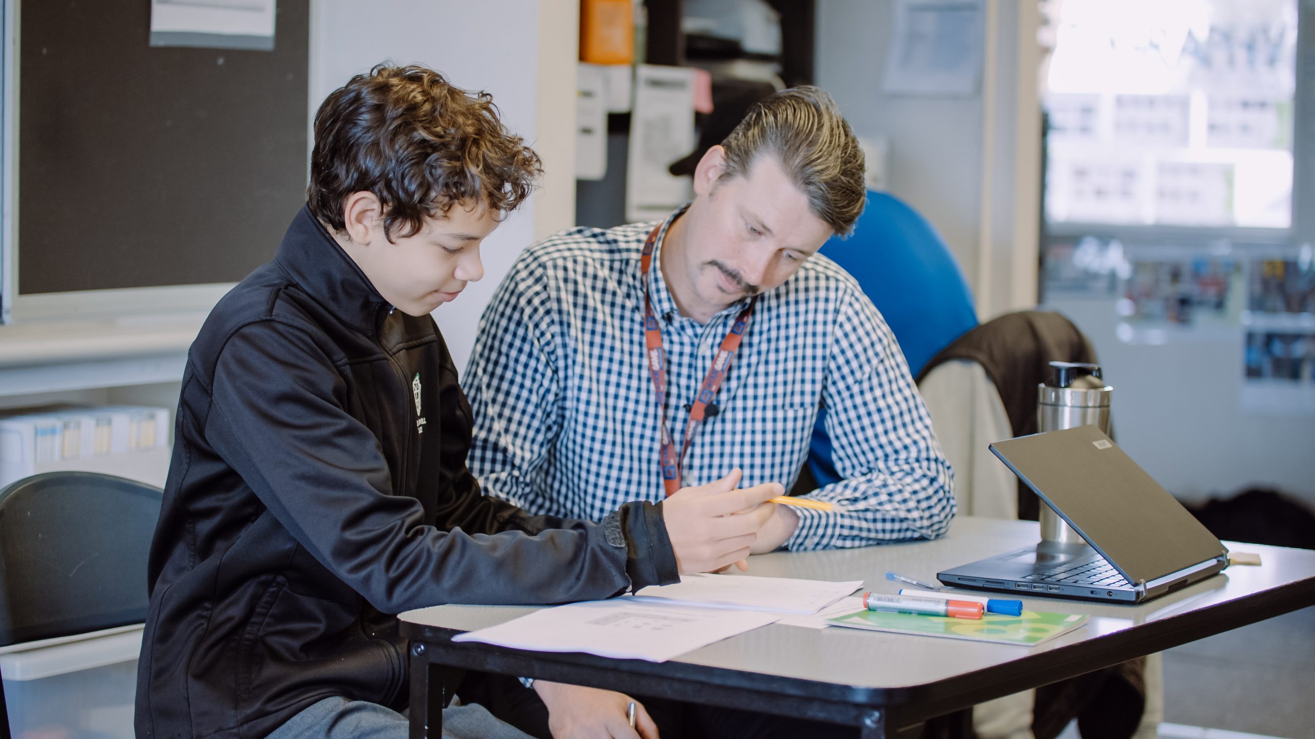 Teacher using Instructive maths resource in classroom